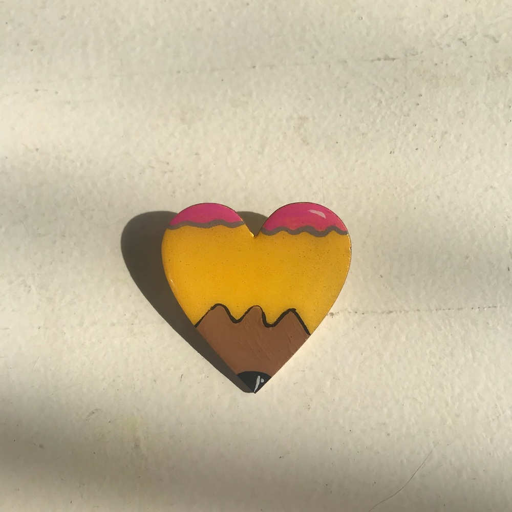 Pencil themed pin